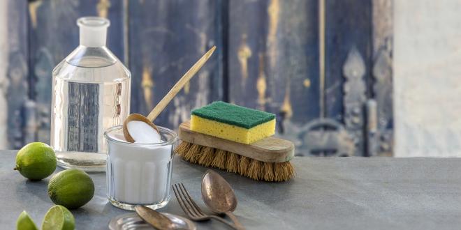 Eco friendly cleaning items with a rustic background.