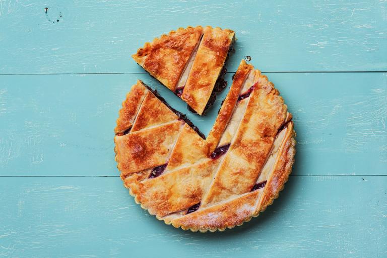 gluten-free cherry pie on blue wood background